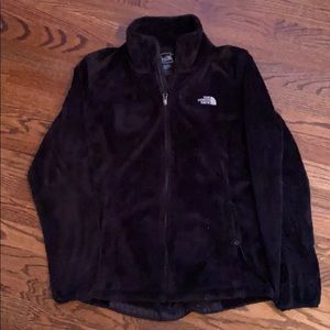 black furry north face jacket